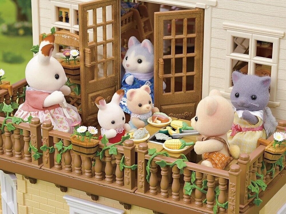 Sylvanian Families Rdeča streha podeželska hiša s pohištvom in posebnimi oblekami